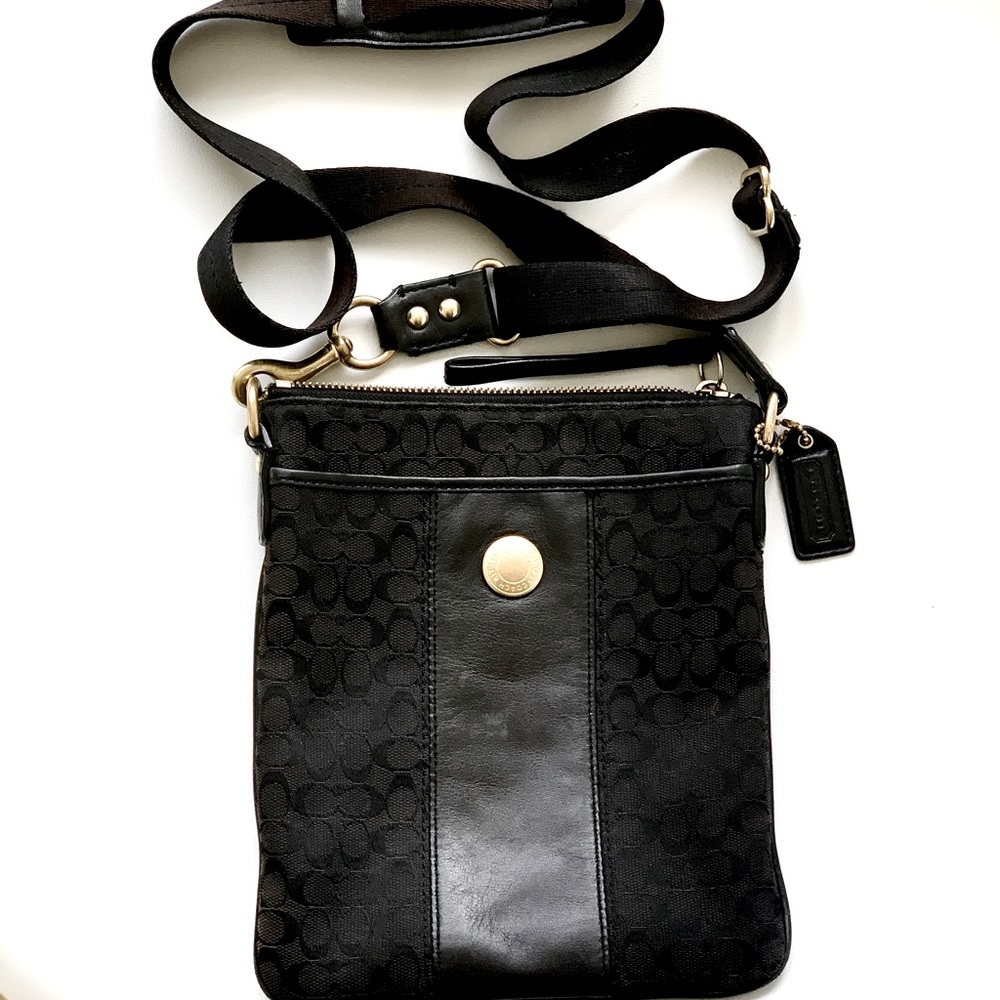 Black leather satchel by Coach